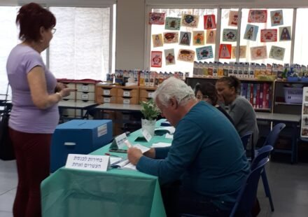 Ballot papers and voting arrangements inside a polling station in Israel.