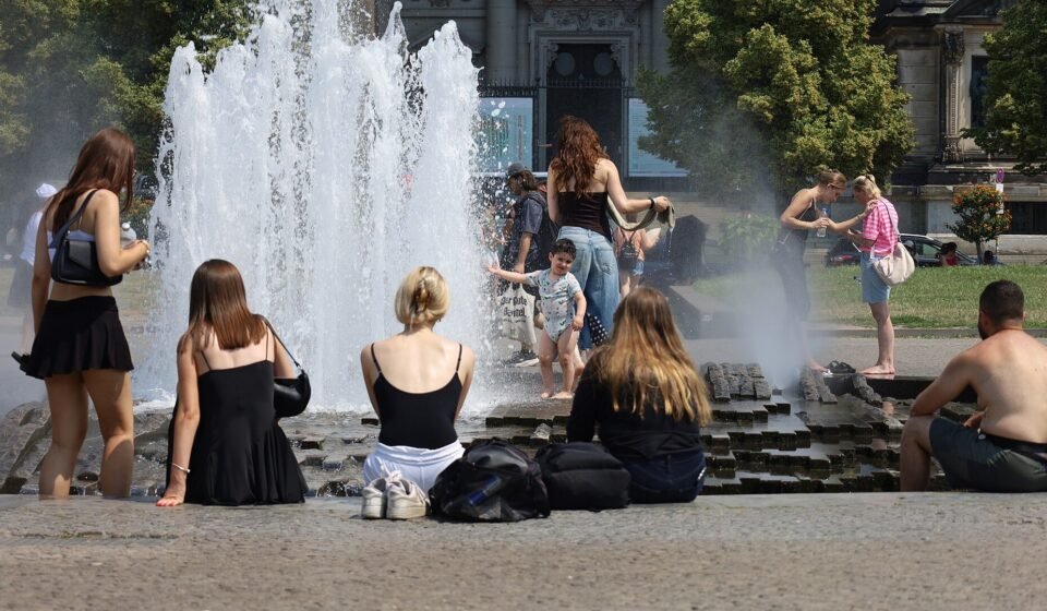 Europe’s Deadly Summer Heat: Climate Change Linked to Most of an Estimated 50,000 Deaths People cooling off in a fountain during a summer heatwave in Berlin, Germany.