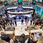 Stock market trading floor at the New York Stock Exchange, illustrating market movements amid investor concerns over artificial intelligence spending and technology stock valuations.