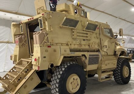 An armoured MRAP vehicle being equipped with additional gunner protection in Port-au-Prince, Haiti, in August 2024.