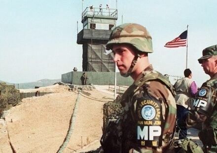 Soldiers and security fencing near the border separating South Korea and North Korea.