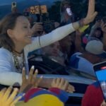 Venezuelan opposition leader María Corina Machado speaking at a public event.