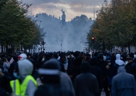 Demonstrators gather amid tear gas at Place de la République in Paris during the October 17, 2026 unrest.