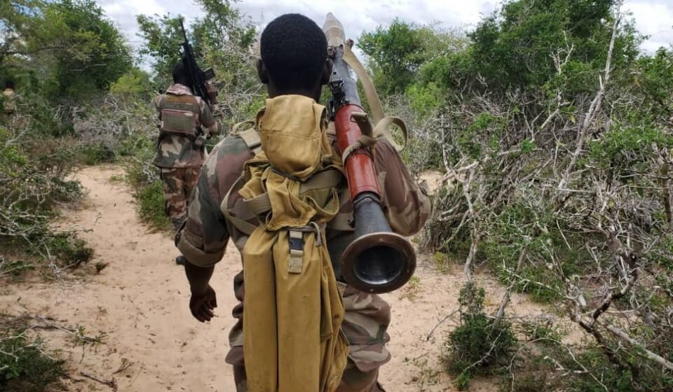 Somali National Army soldier carrying an RPG-7 rifle during counterinsurgency operations.