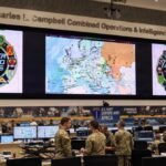 NATO flags representing cooperation among European and North American allies on security issues involving Russia.