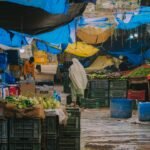 Wholesale vegetable market in India, illustrating food-price pressures and the country’s economic outlook.